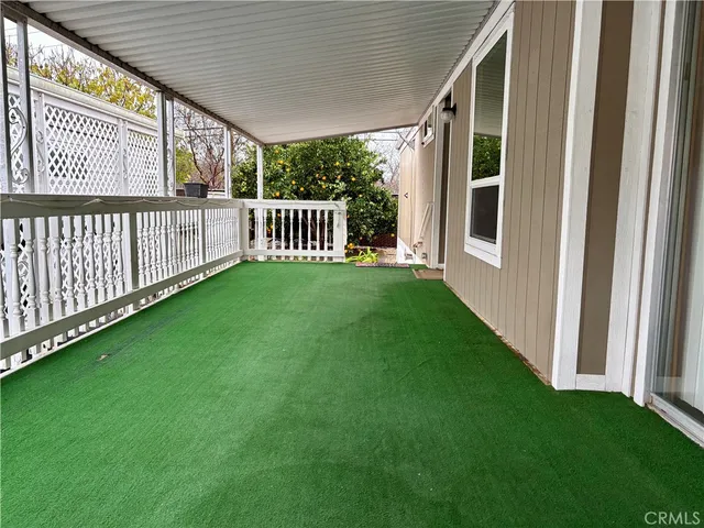 a view of a porch with a yard