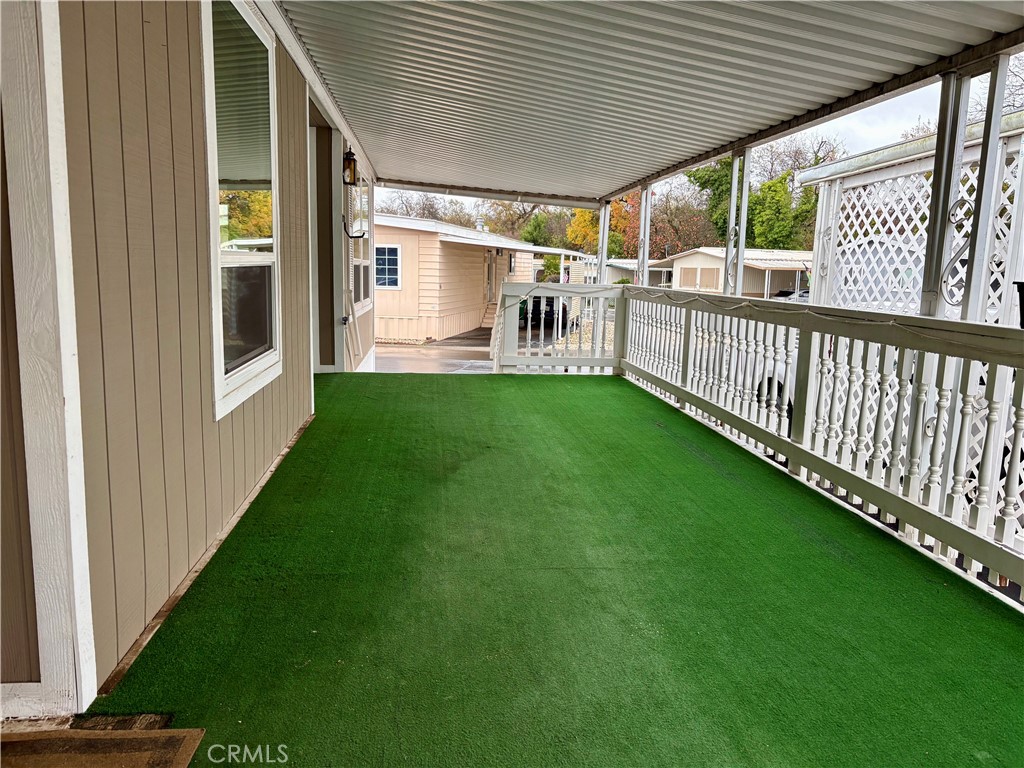 1901 Dayton Road, Unit 6 Chico, CA 95928 - Photo 24 of 25 a view of a porch with a table and chairs