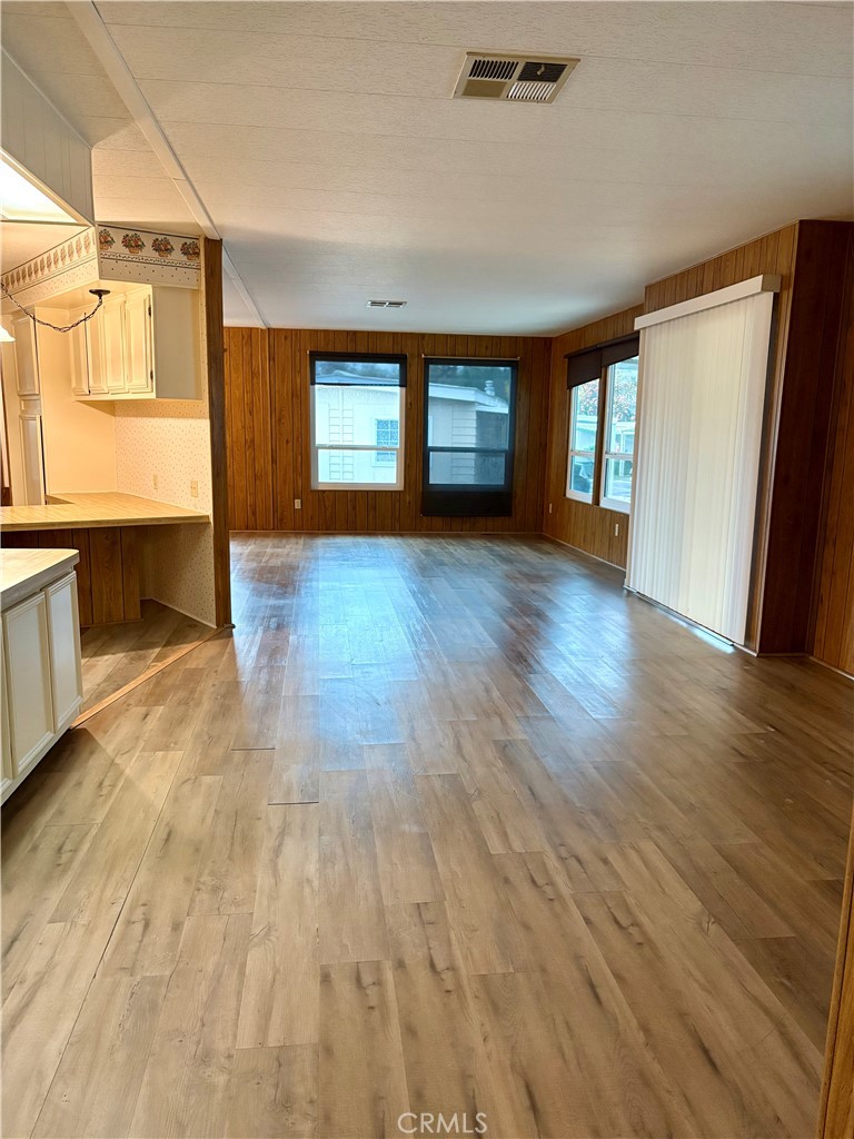 1901 Dayton Road, Unit 6 Chico, CA 95928 - Photo 3 of 25 a view of a room with window and wooden floor
