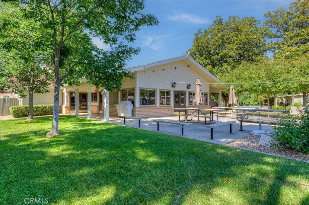 1901 Dayton Road, Unit 6 Chico, CA 95928 - Photo 31 of 36 a view of a house with a backyard porch and sitting area