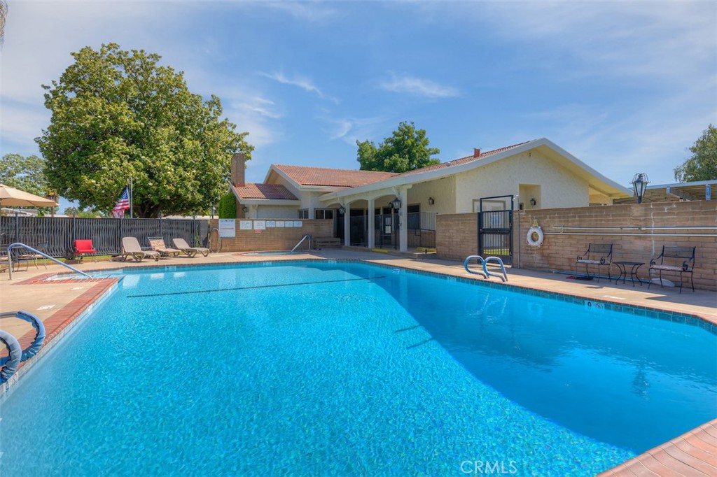 1901 Dayton Road, Unit 6 Chico, CA 95928 - Photo 34 of 36 a view of a house with pool and chairs