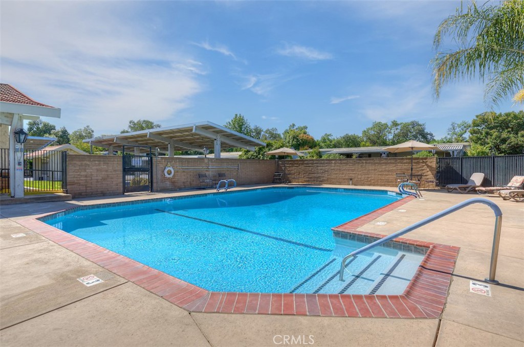 1901 Dayton Road, Unit 6 Chico, CA 95928 - Photo 35 of 36 a view of a swimming pool with a lounge chair