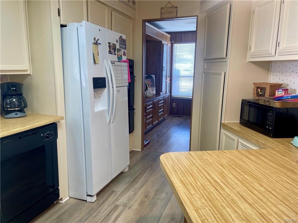 1901 Dayton Road, Unit 6 Chico, CA 95928 - Photo 4 of 16 a kitchen with stainless steel appliances a refrigerator and a stove