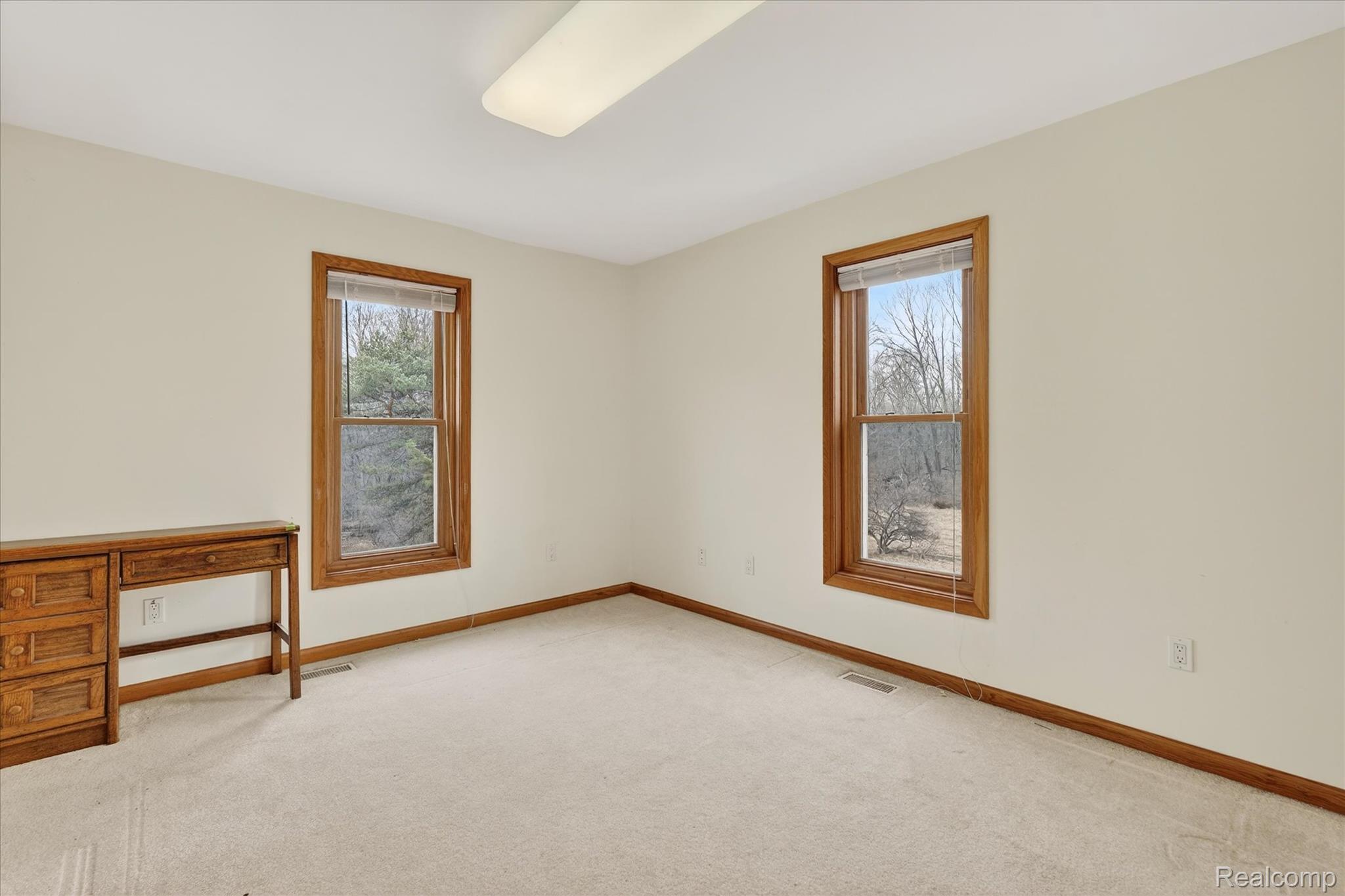 5640 Fisher Road Howell, MI 48855 - Photo 27 of 66 Empty room featuring light colored carpet and baseboards