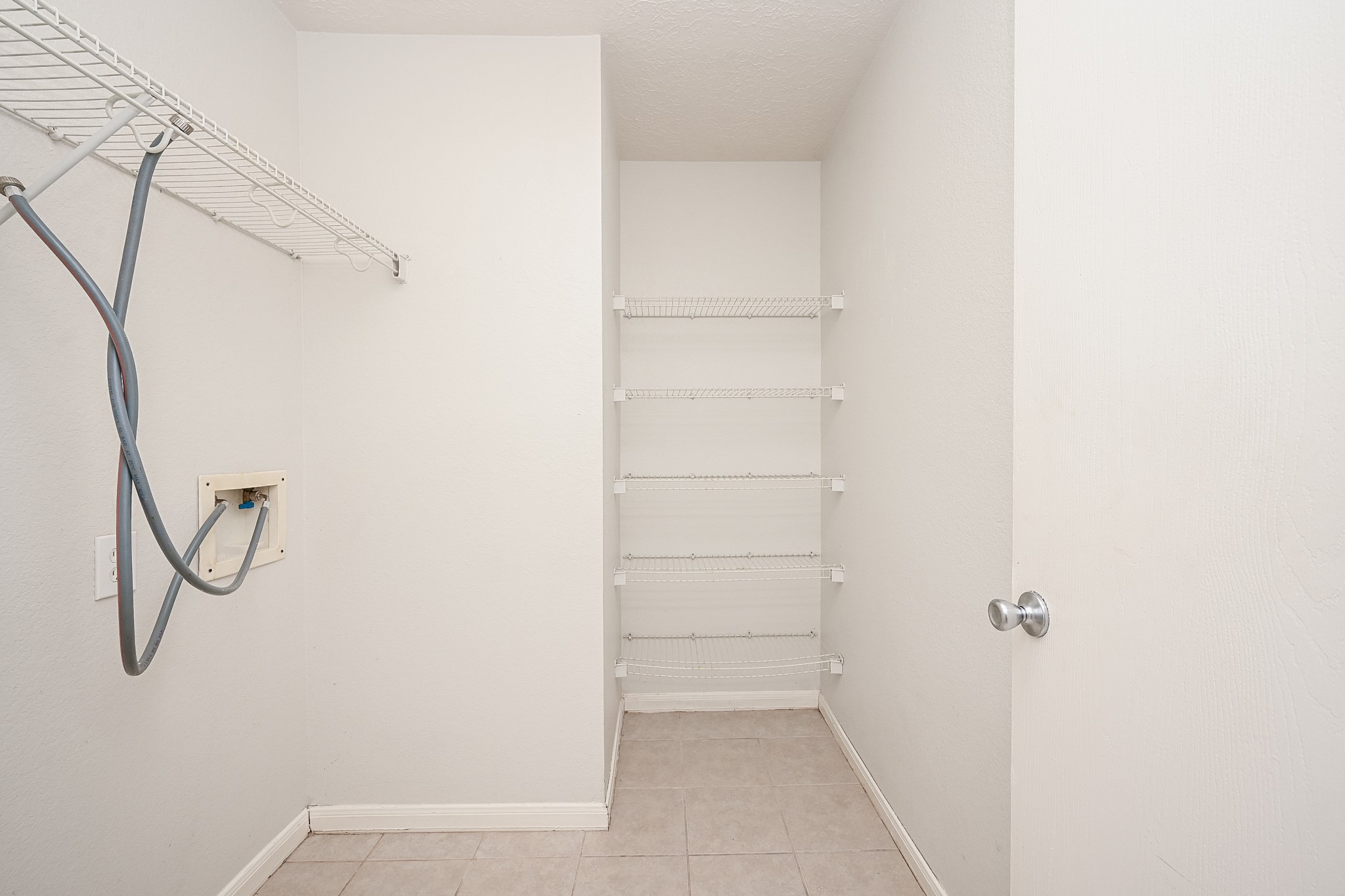 3635 Garrison Run Drive Spring, TX 77386 - Photo 22 of 32 Texas sized laundry room with spacious racking for any storage needs.