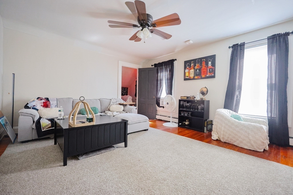 104 Grove Street Fall River, MA 02720 - Photo 24 of 37 a living room with furniture and a large window