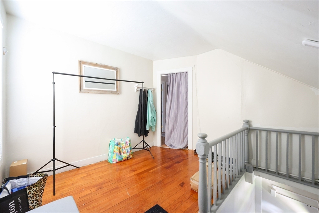 104 Grove Street Fall River, MA 02720 - Photo 29 of 37 a bedroom with bed and a window