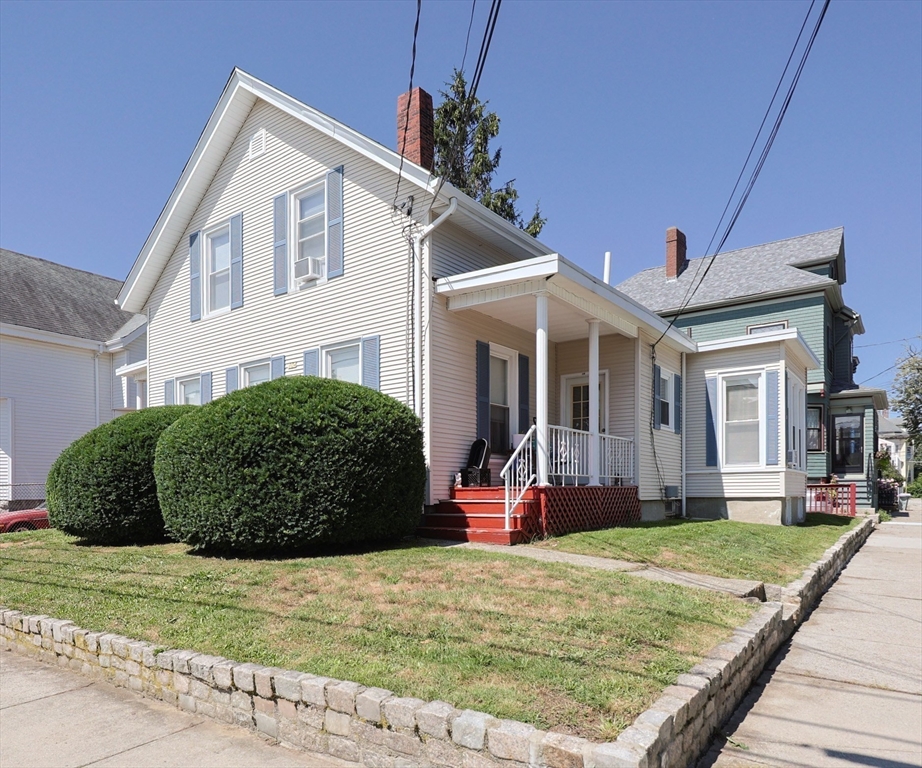 104 Grove Street Fall River, MA 02720 - Photo 3 of 37 a view of a house with a backyard