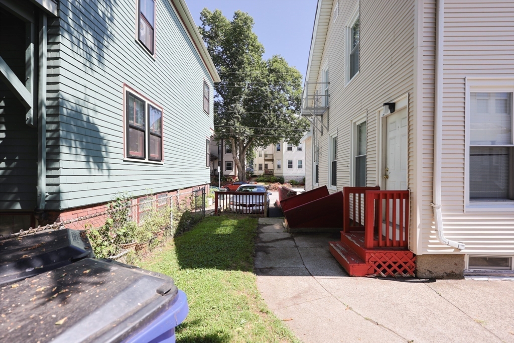 104 Grove Street Fall River, MA 02720 - Photo 33 of 37 a view of a back yard of the house