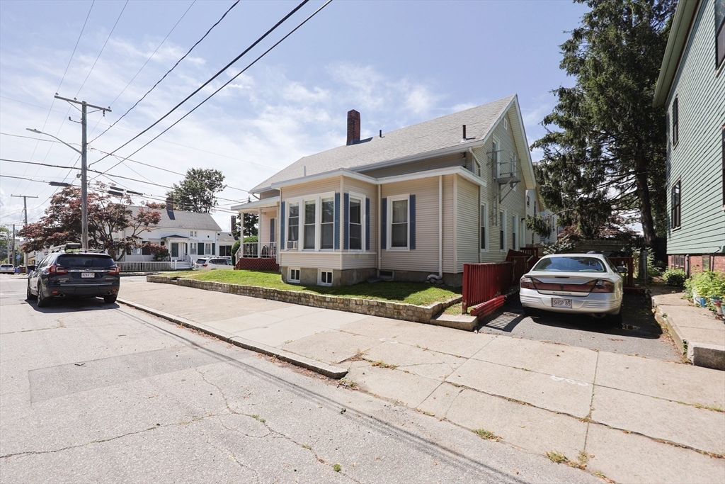 104 Grove Street Fall River, MA 02720 - Photo 4 of 37 a car parked in front of a house