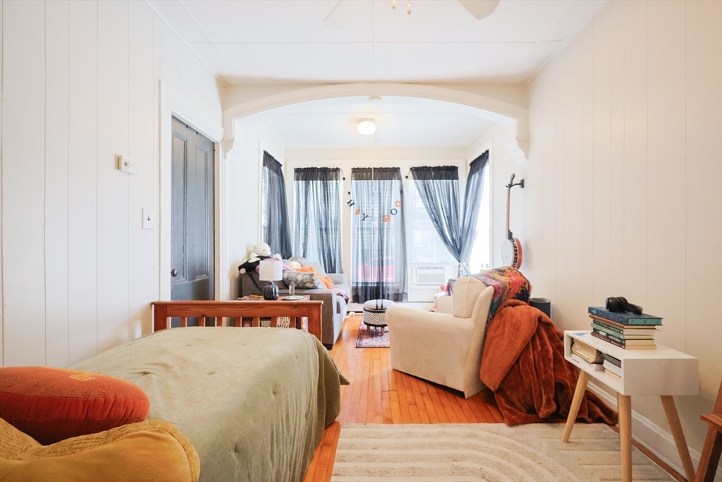 104 Grove Street Fall River, MA 02720 - Photo 8 of 37 a bedroom with furniture and a large window