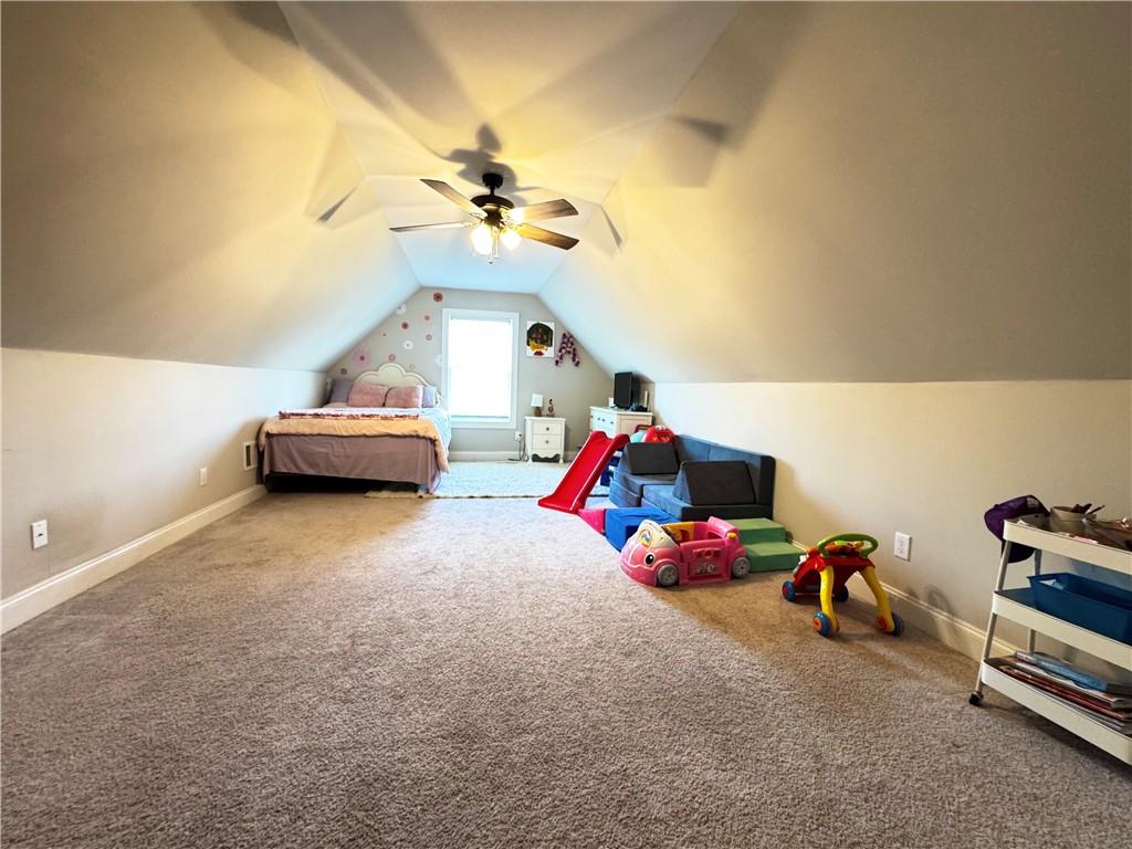 4515 Jacksonville Road Tallapoosa, GA 30176 - Photo 31 of 40 a view of room with toys and a chandelier