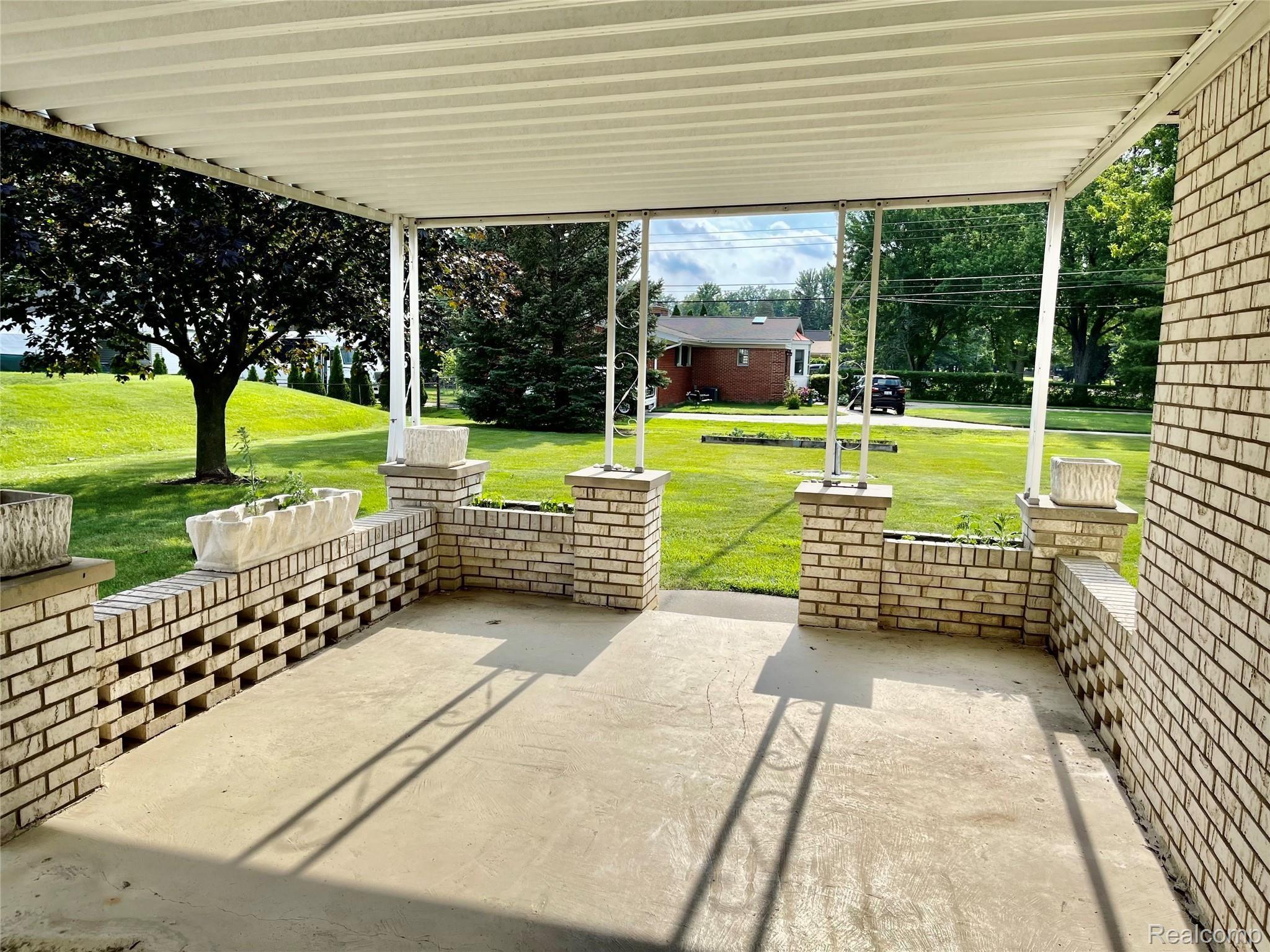 37481 Ryan Road Sterling Heights, MI 48310 - Photo 10 of 47 Covered patio from under.jpg