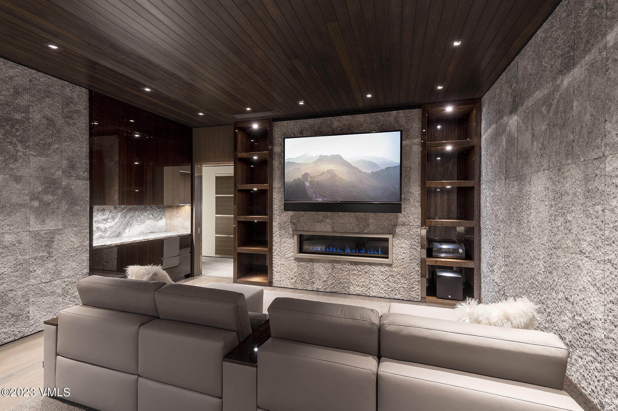 463 Beaver Dam Road Vail, CO 81657 - Photo 16 of 21 a living room with furniture and a flat screen tv