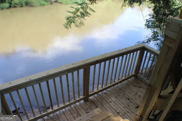 a balcony with view of lake