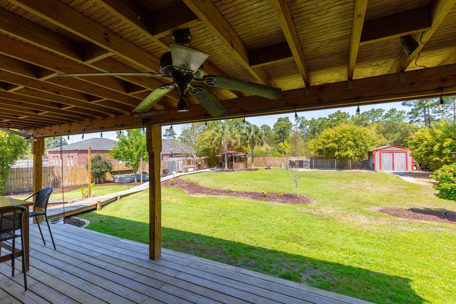7780 Fenwick Street Navarre, FL 32566 - Photo 21 of 31 a view of swimming pool with a patio