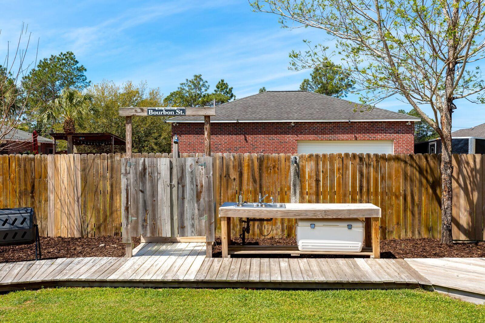 7780 Fenwick Street Navarre, FL 32566 - Photo 24 of 31 a view of outdoor space with seating area