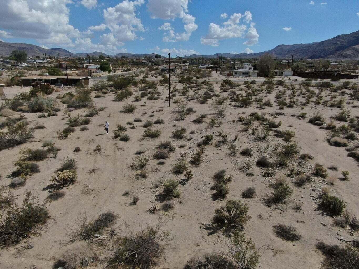 217 Serrano Drive Twentynine Palms, CA 92277 - Photo 2 of 10 a view of a sky view of building