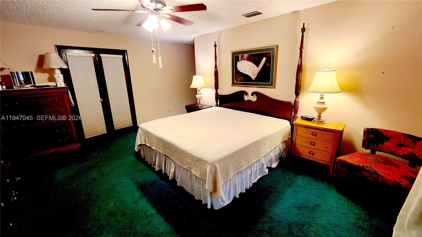 15151 Southwest 166th Street Miami, FL 33187 - Photo 12 of 37 a bed room with a bed and a tv