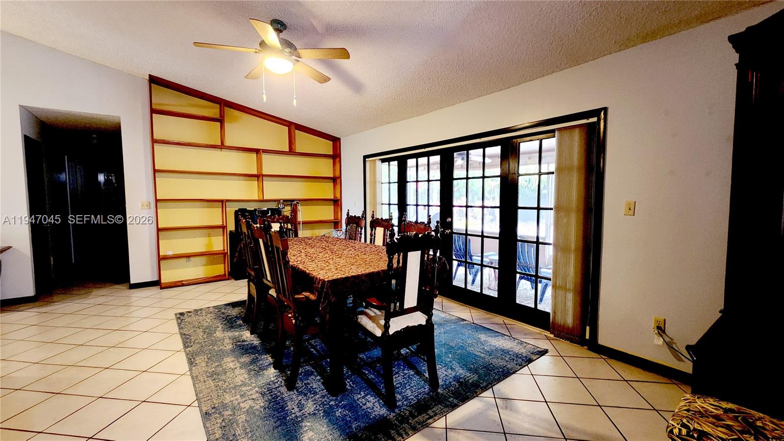 15151 Southwest 166th Street Miami, FL 33187 - Photo 3 of 37 a view of a dining room with furniture and window