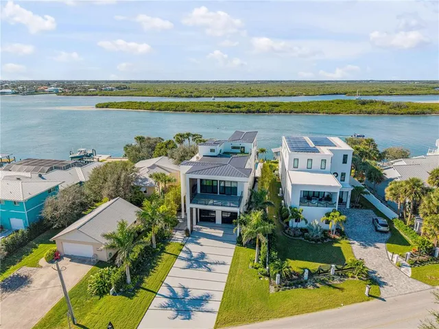 a view of a balcony with furniture