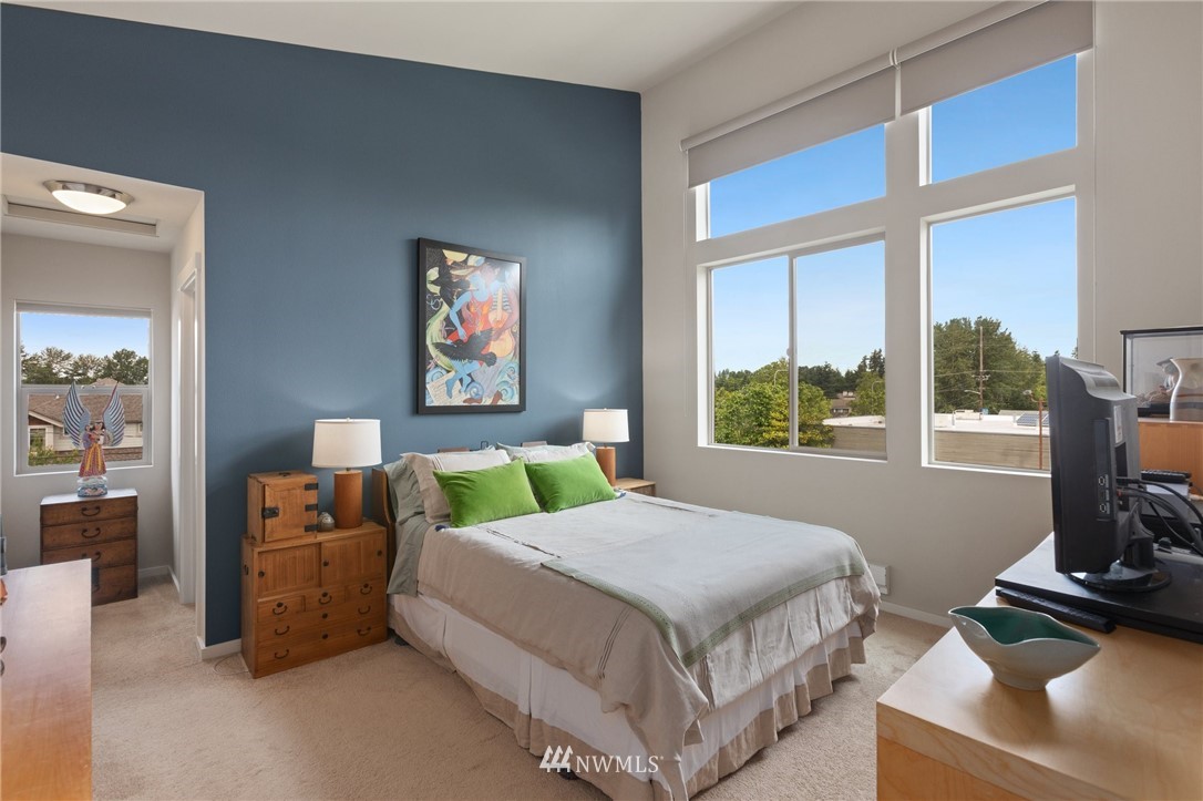 4514 Northeast 3rd Lane Renton, WA 98059 - Photo 11 of 22 a bedroom with a bed and a window