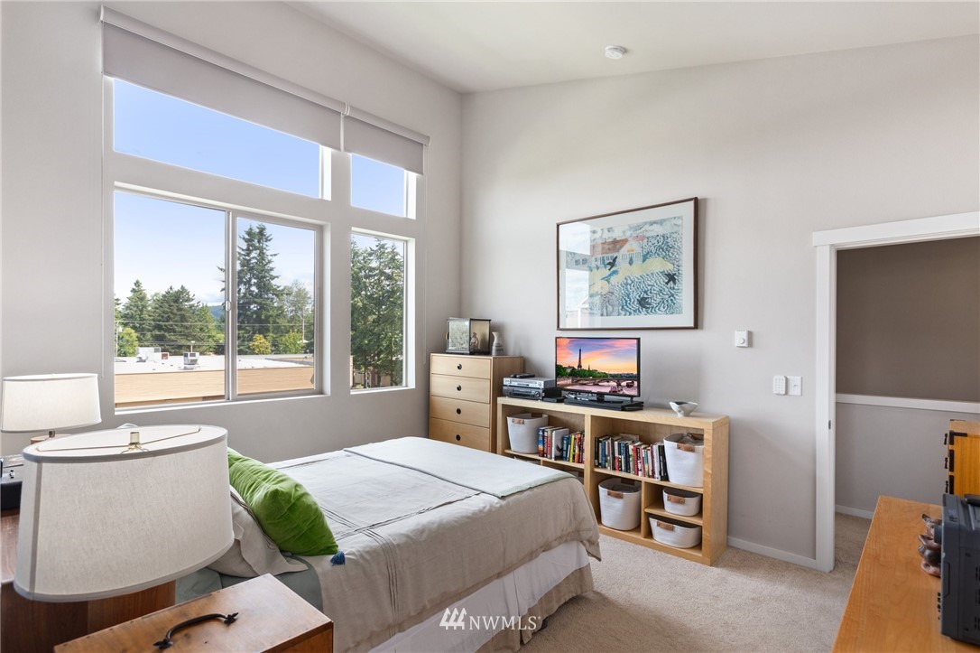 4514 Northeast 3rd Lane Renton, WA 98059 - Photo 13 of 22 a bed room with a bed and a window