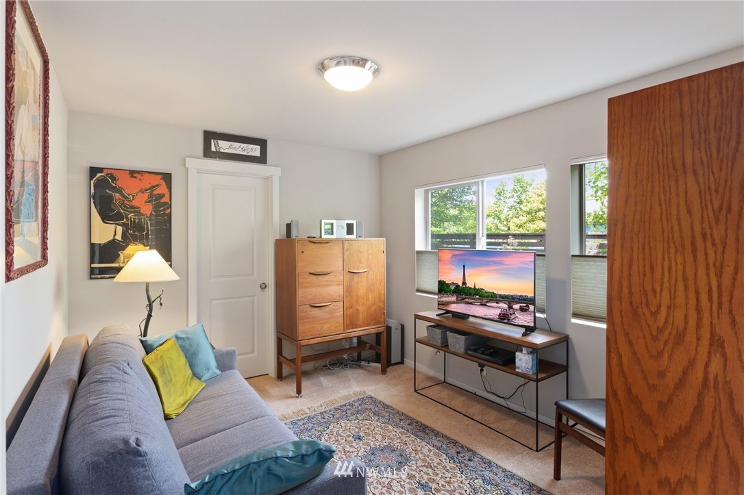 4514 Northeast 3rd Lane Renton, WA 98059 - Photo 16 of 22 a bedroom with a bed and a window