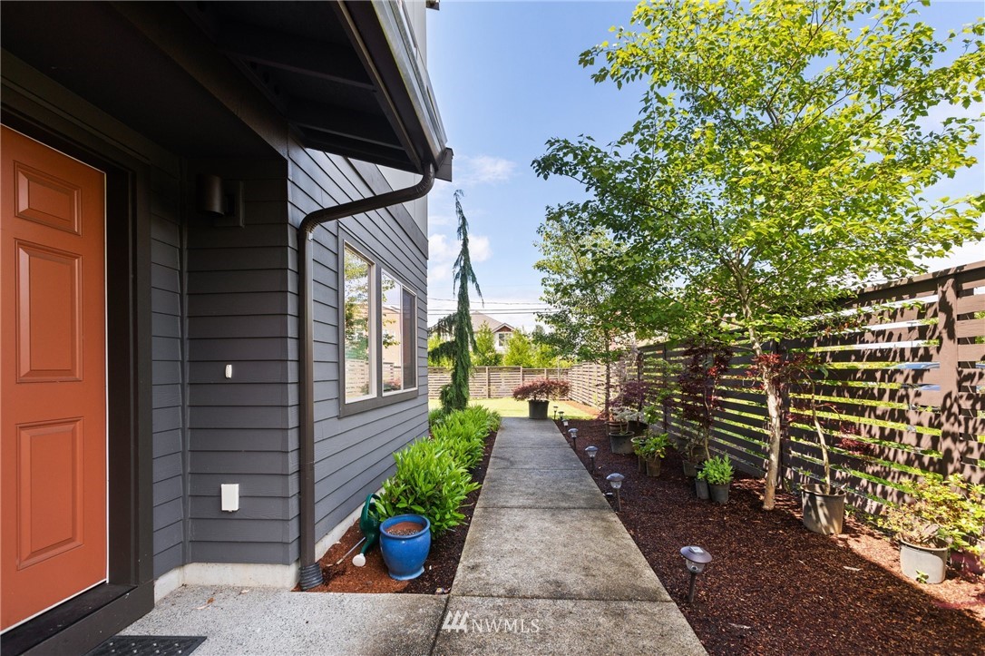 4514 Northeast 3rd Lane Renton, WA 98059 - Photo 20 of 22 a view of a pathway that has potted plants