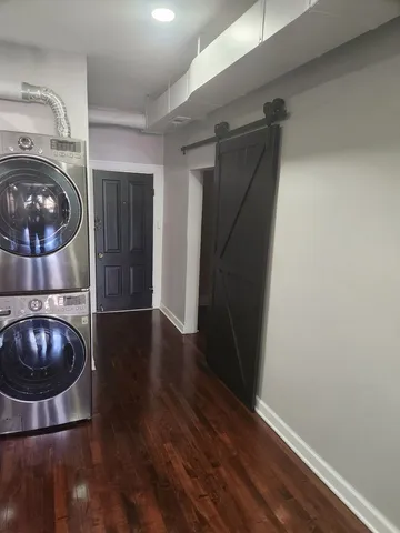 a view of a livingroom with wooden floor