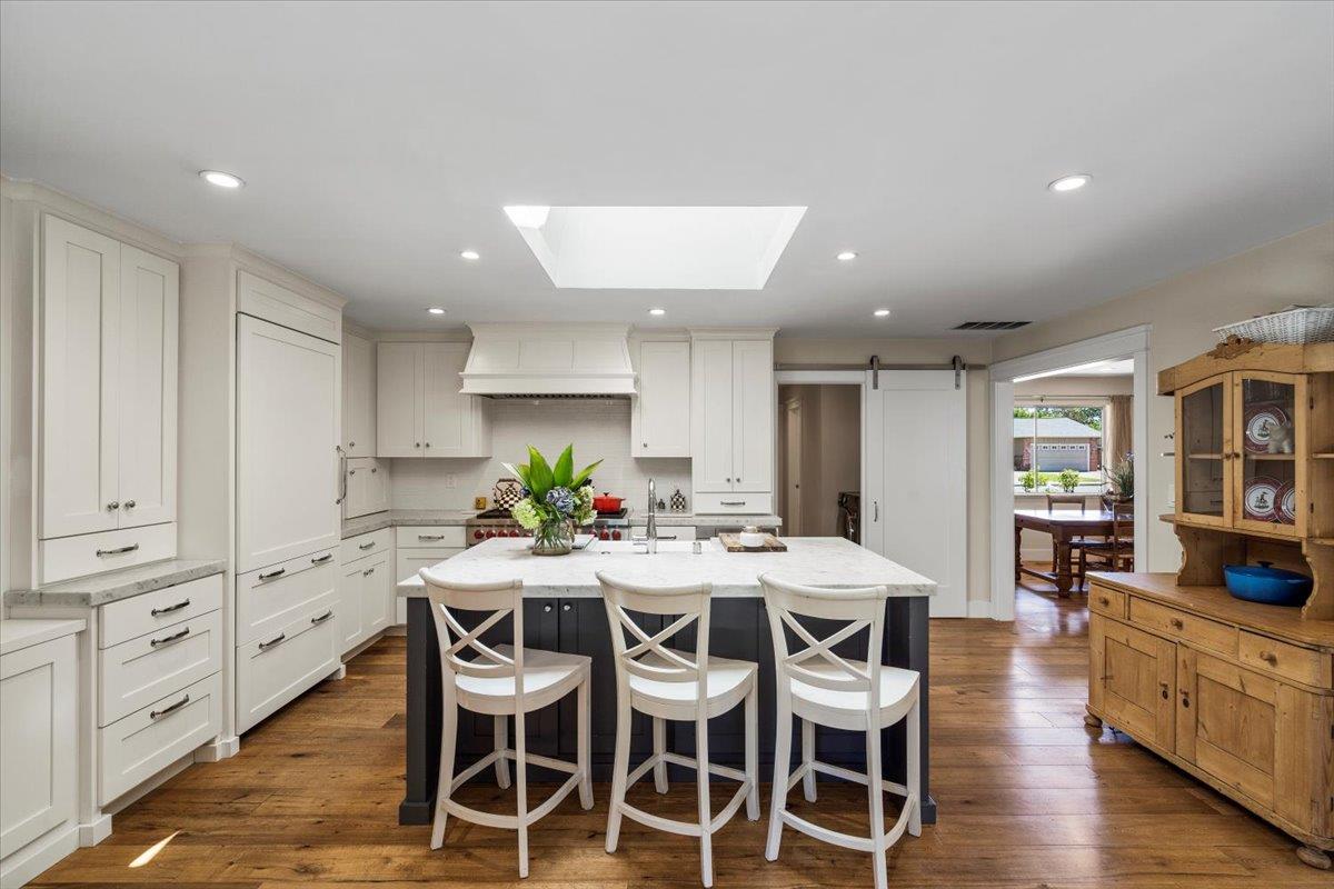 2732 Doverton Square Mountain View, CA 94040 - Photo 12 of 30 a view of a dining room with furniture and wooden floor