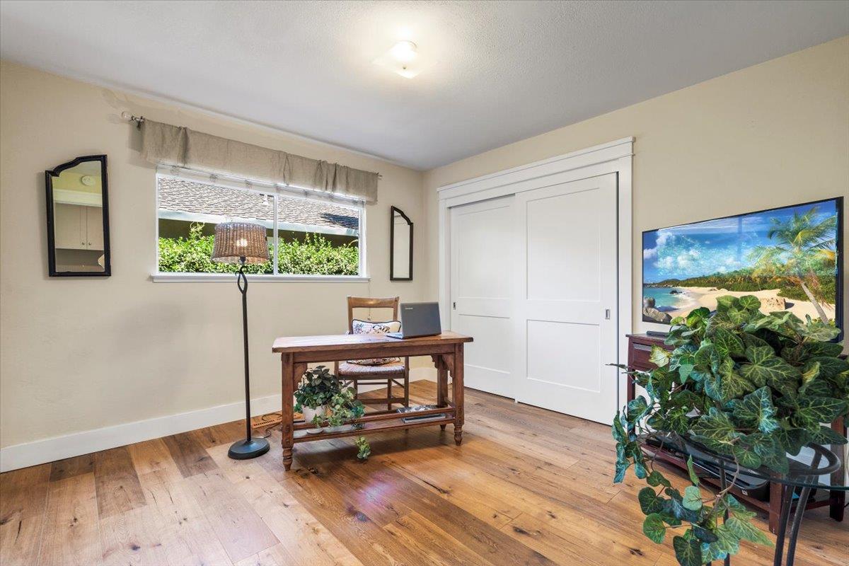 2732 Doverton Square Mountain View, CA 94040 - Photo 14 of 30 a view of a room with wooden floor and a potted plant