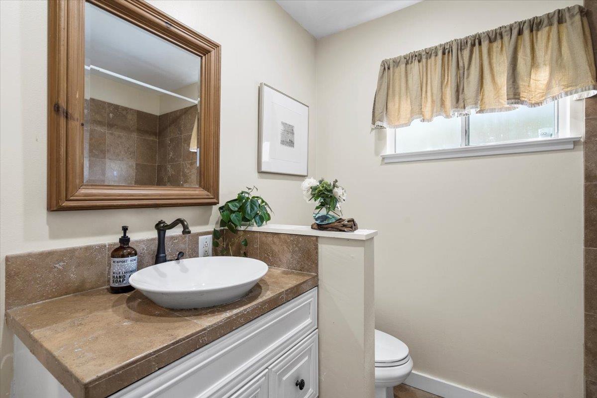 2732 Doverton Square Mountain View, CA 94040 - Photo 18 of 30 a bathroom with a granite countertop sink and a mirror