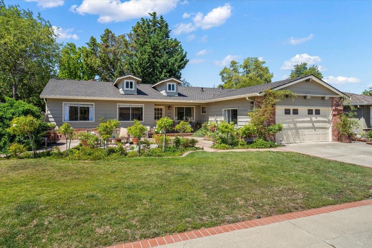2732 Doverton Square Mountain View, CA 94040 - Photo 24 of 30 a front view of a house with a garden