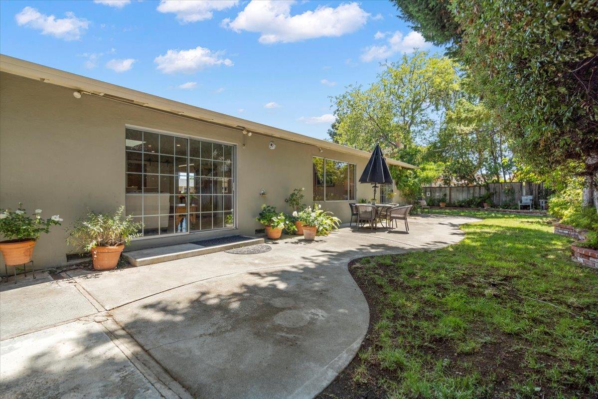 2732 Doverton Square Mountain View, CA 94040 - Photo 28 of 30 a view of a house with backyard sitting area and garden