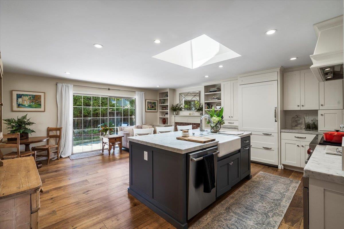2732 Doverton Square Mountain View, CA 94040 - Photo 4 of 30 a kitchen with a stove sink and wooden floor