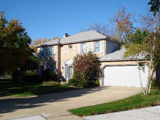 1610 Forest Ridge Road St. Charles, IL 60174 - Photo 1 of 1 a front view of a house with garden