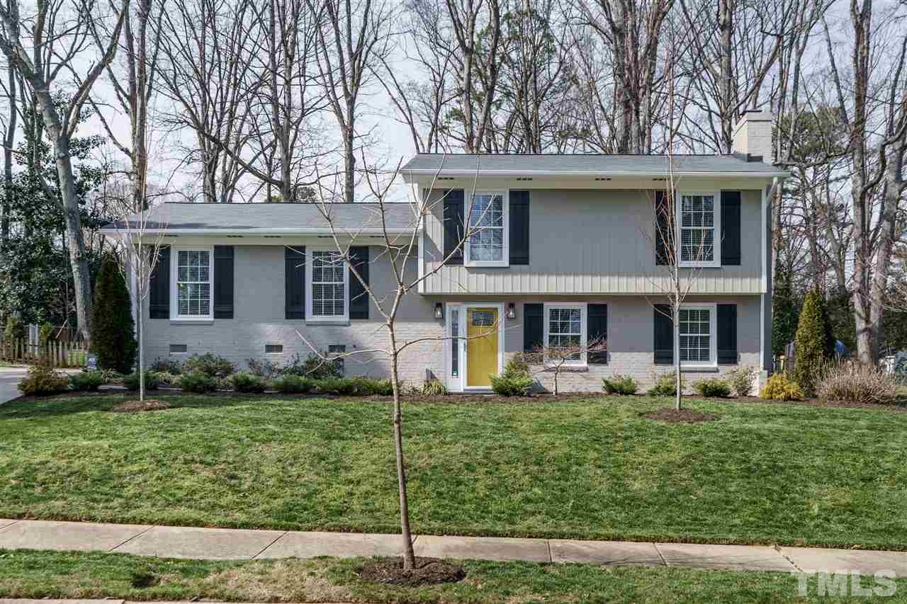 419 East Rowan Street Raleigh, NC 27609 - Photo 2 of 30 front view of a house with a yard