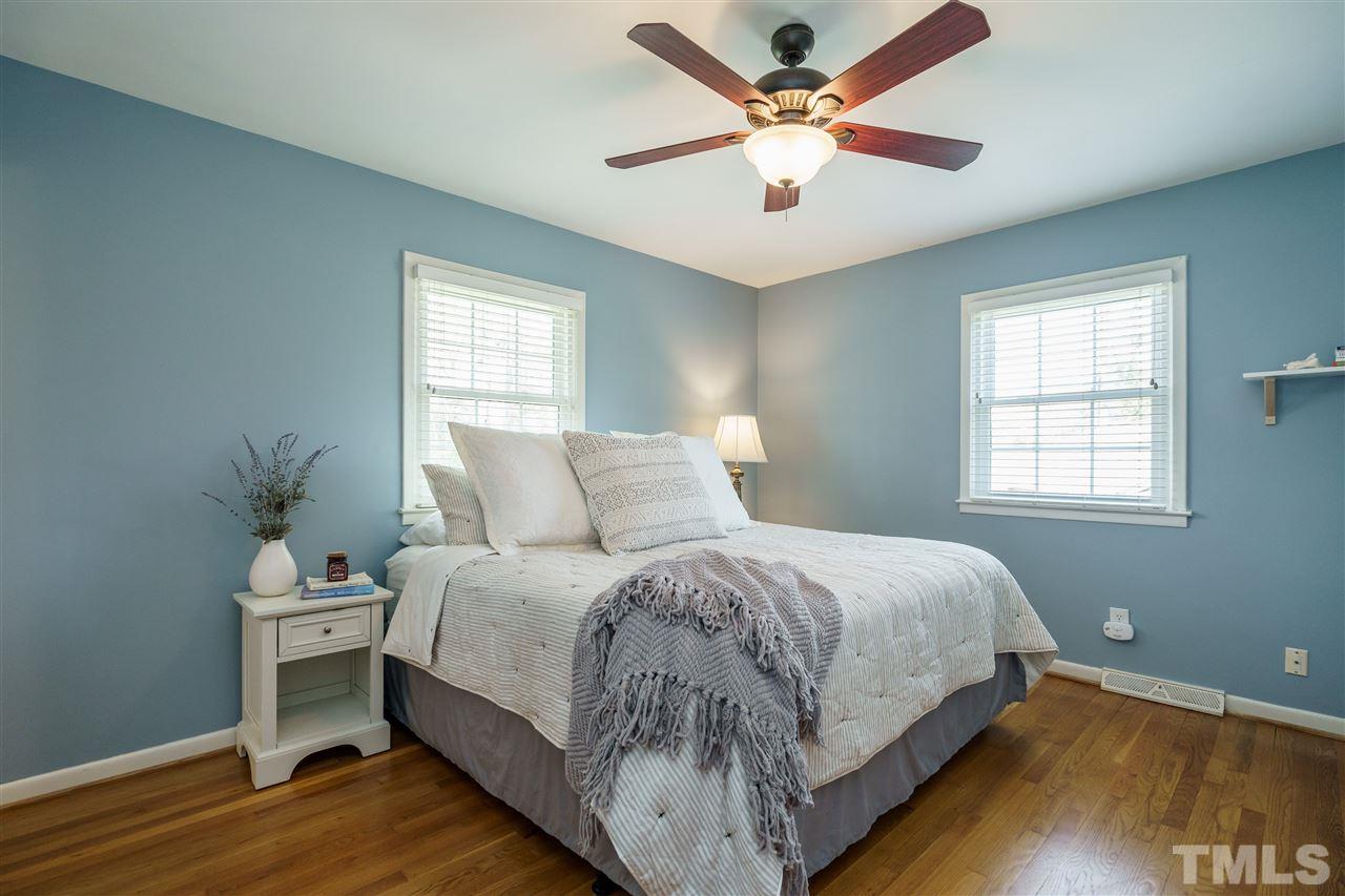 419 East Rowan Street Raleigh, NC 27609 - Photo 16 of 30 a bed room with a bed and a window