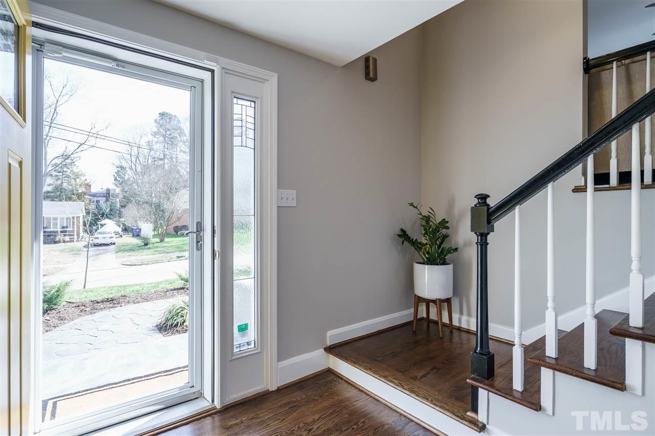 419 East Rowan Street Raleigh, NC 27609 - Photo 3 of 30 a view of an entryway with wooden floor and door
