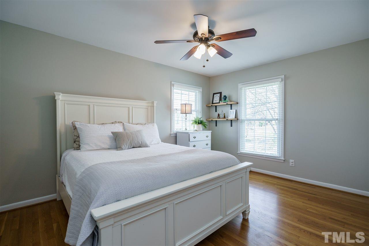 419 East Rowan Street Raleigh, NC 27609 - Photo 22 of 30 a bed room with a bed and a window