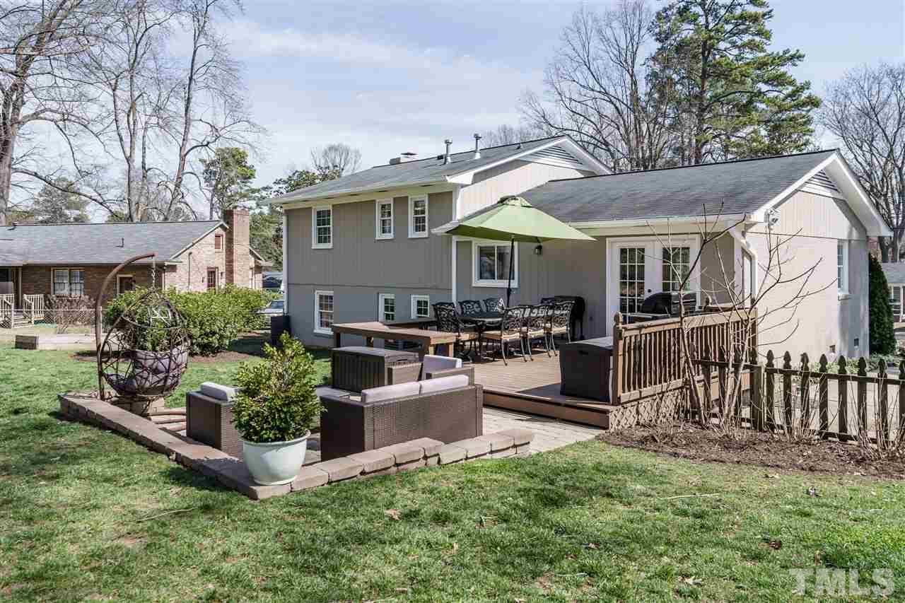 419 East Rowan Street Raleigh, NC 27609 - Photo 30 of 30 a view of a house with backyard and porch