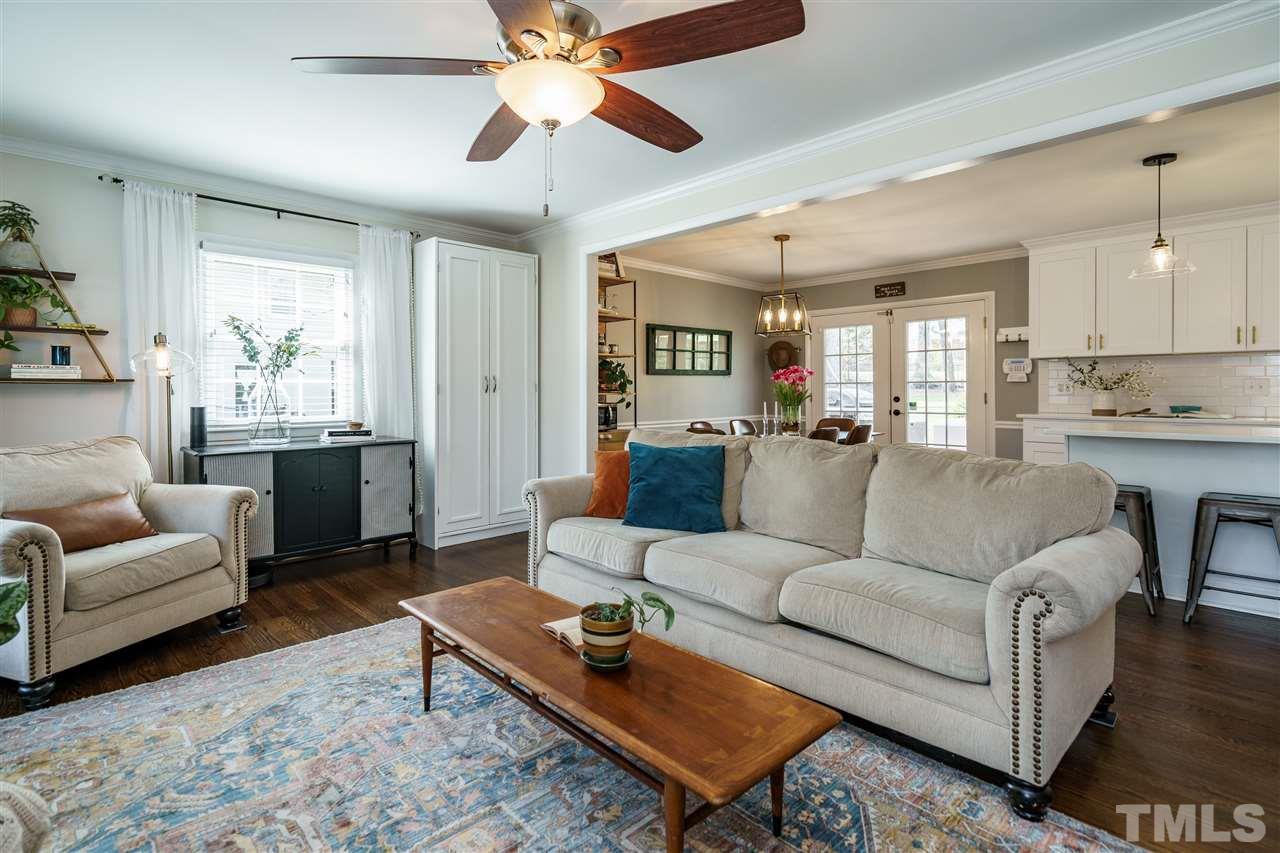 419 East Rowan Street Raleigh, NC 27609 - Photo 7 of 30 a living room with furniture and a large window
