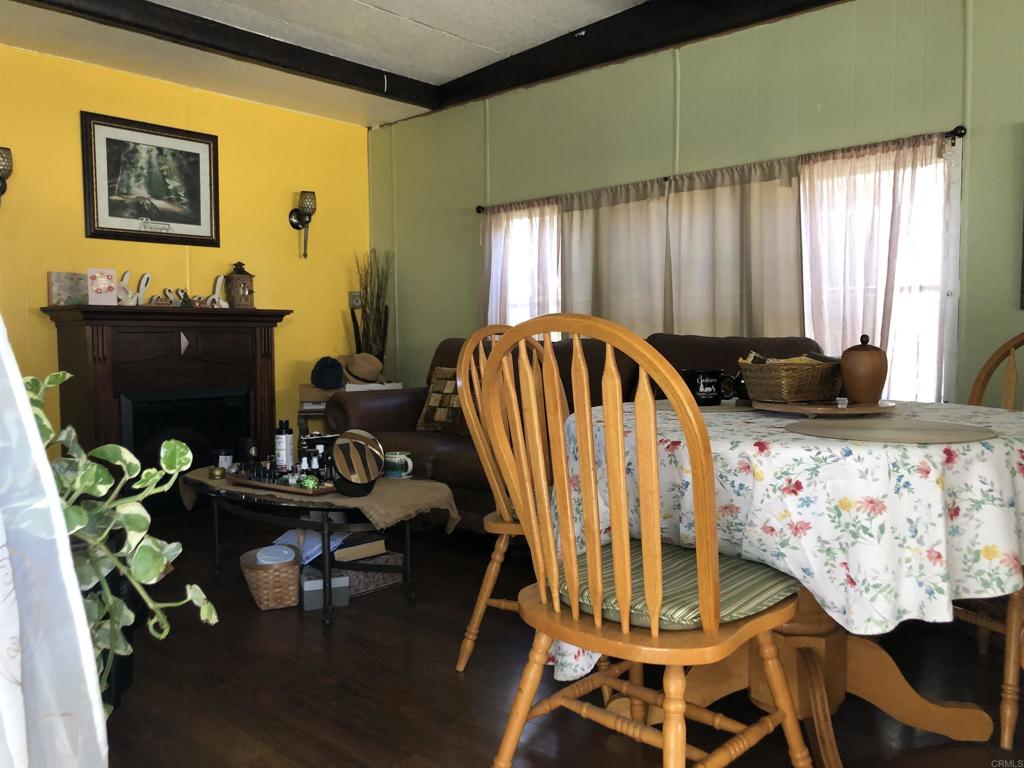 145 East Aviation Road, Unit 22 Fallbrook, CA 92028 - Photo 4 of 7 a view of a dining room with furniture