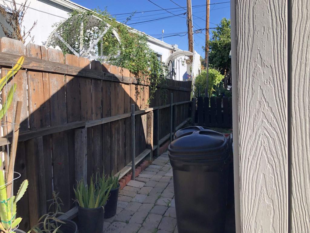 145 East Aviation Road, Unit 22 Fallbrook, CA 92028 - Photo 7 of 7 a backyard of a house with lots of green space