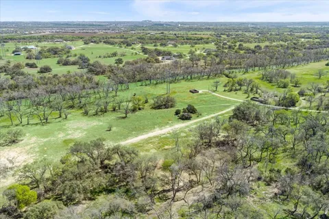 a view of a garden with a fountain