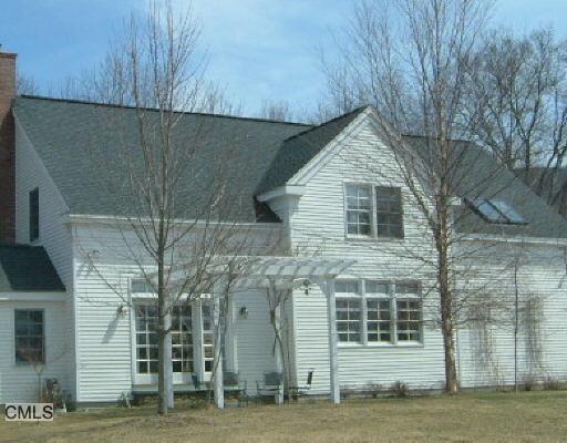 11 Green Hill Road Kent, CT 06757 - Photo 1 of 1 a front view of a house with a garden