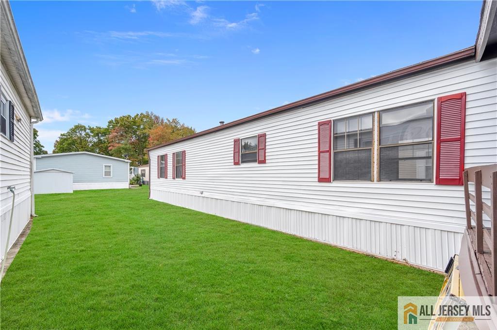 38 Longfellow Road North Brunswick, NJ 08902 - Photo 20 of 23 a view of a house with a backyard