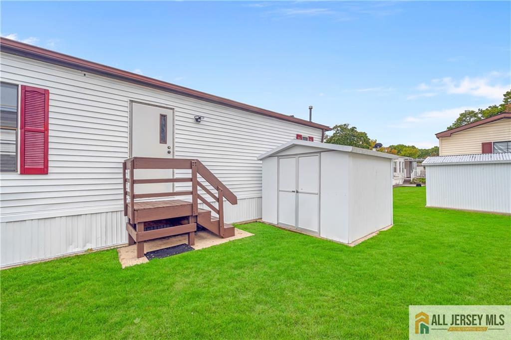 38 Longfellow Road North Brunswick, NJ 08902 - Photo 22 of 23 a view of a backyard with plants