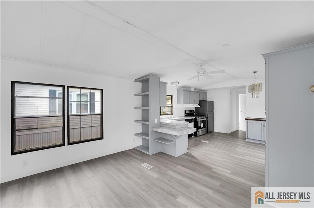 38 Longfellow Road North Brunswick, NJ 08902 - Photo 7 of 23 a view of empty room with wooden floor